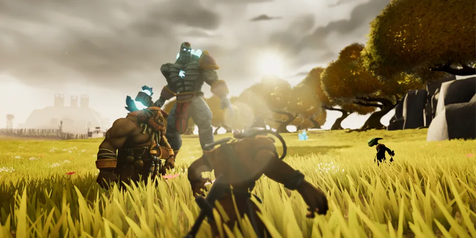 Gameplay: dos guerreros se enfrentan a un gólem de piedra en una pradera amarilla.